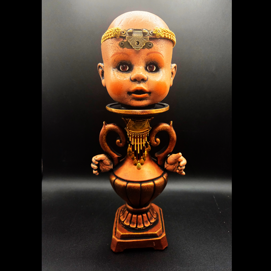 Baby Head Box on a Vase-Shaped Stand